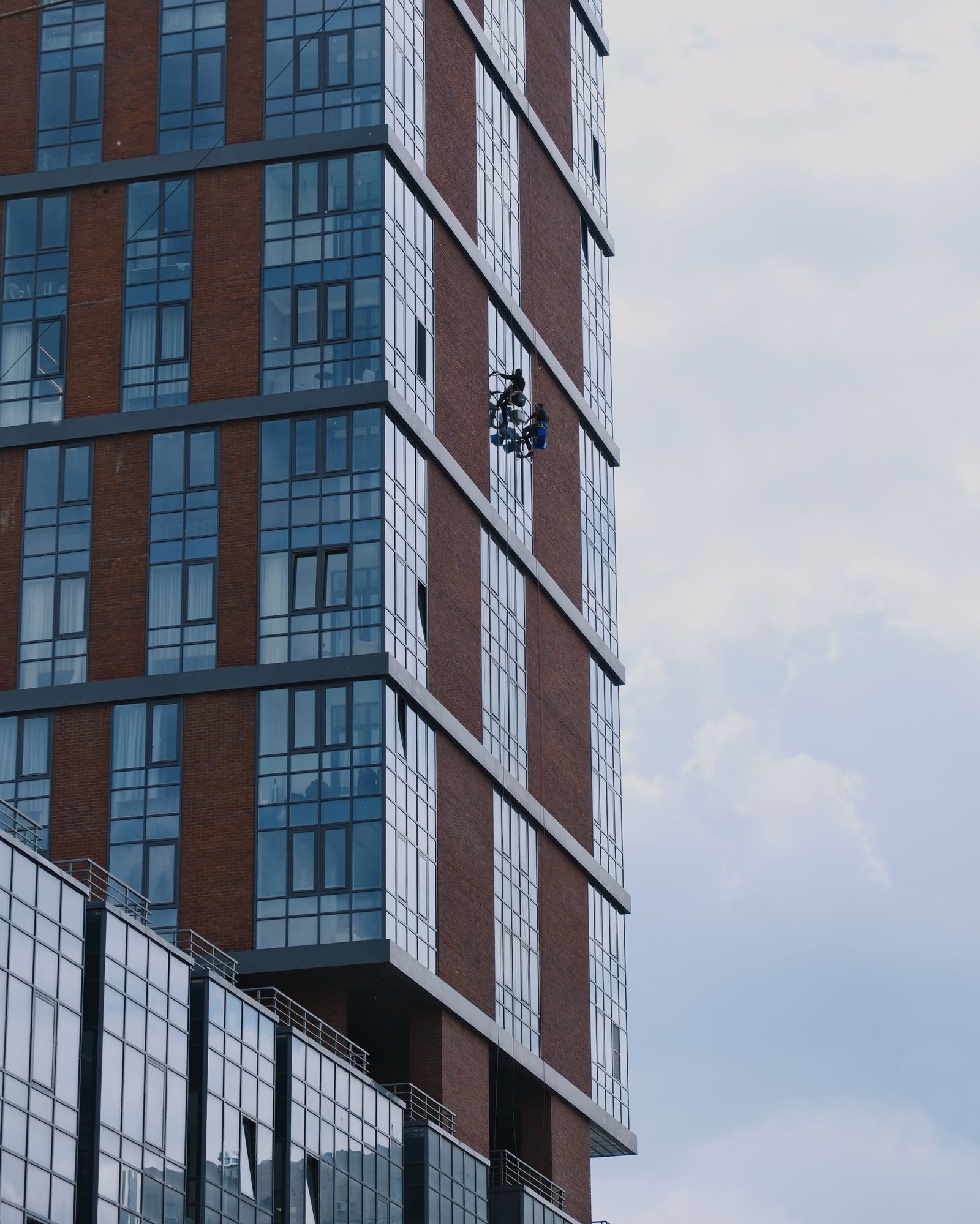 Window cleaning crew on a high-rise commercial building